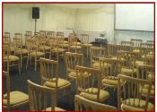 wooden banqueting chair in rows